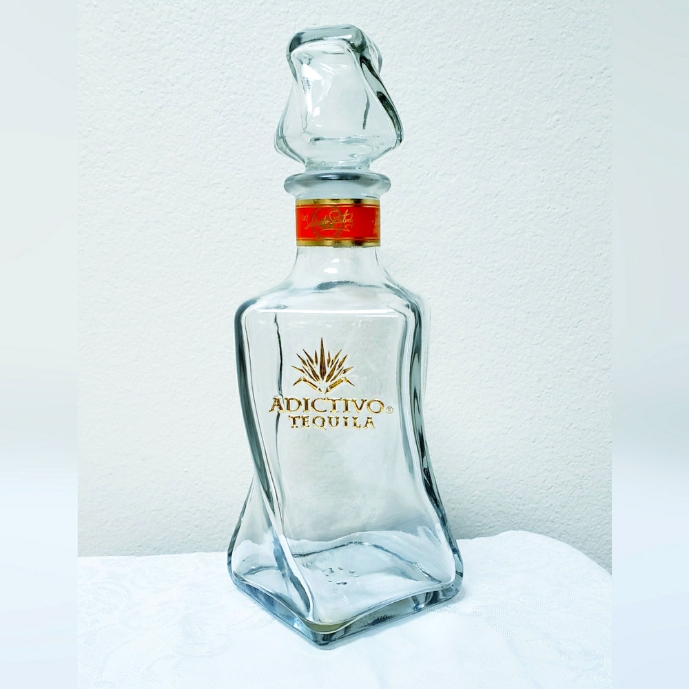 Adictivo Tequila Anejo  Bottle-empty